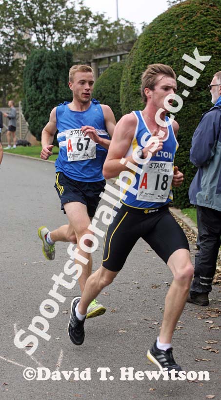 Nick Swinburn (Morpeth Harriers) battle for the lead with Tom Carson (Bolton Harriers) in the Northern Mens 6 Stage Road Relay.